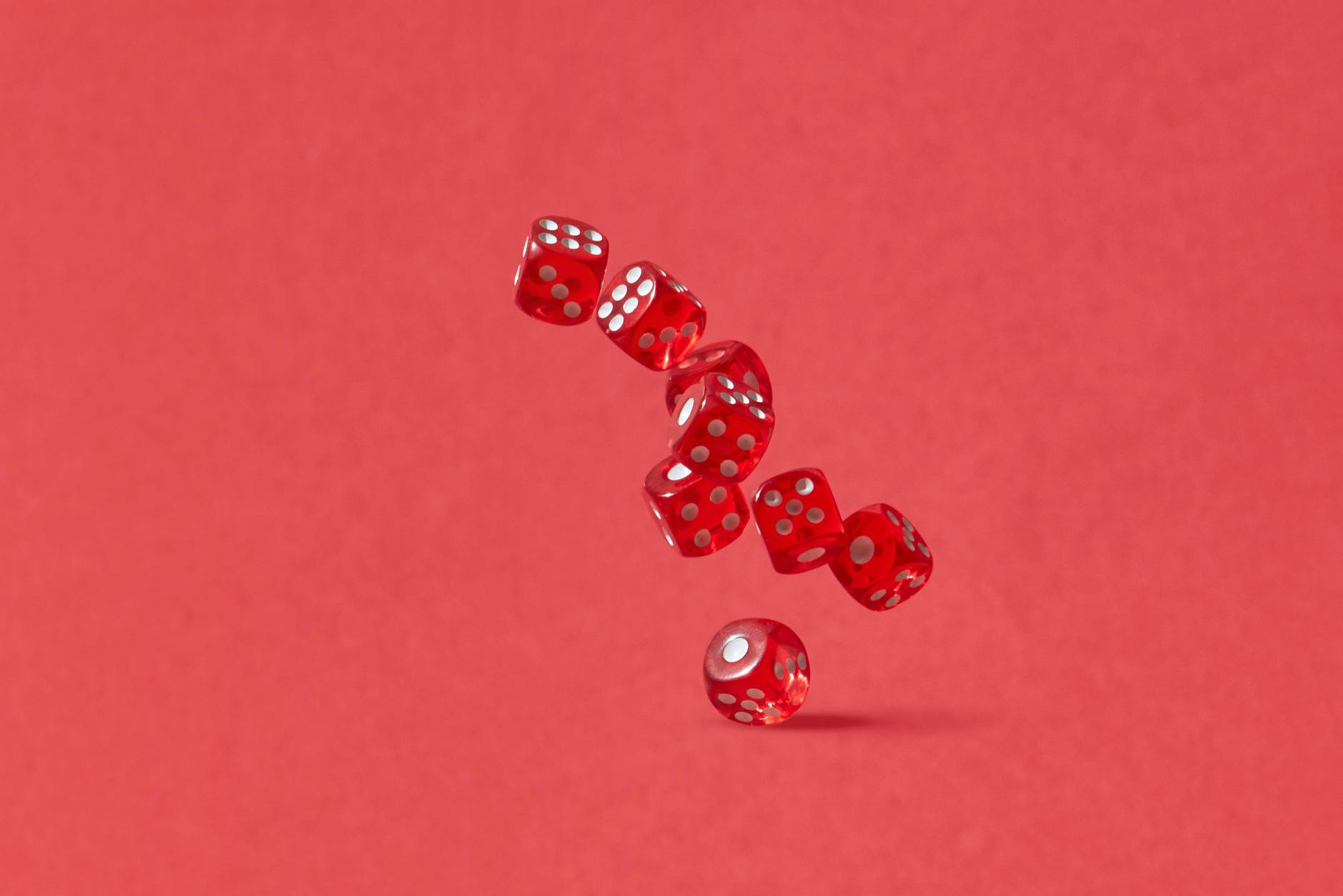 red dice in the air
